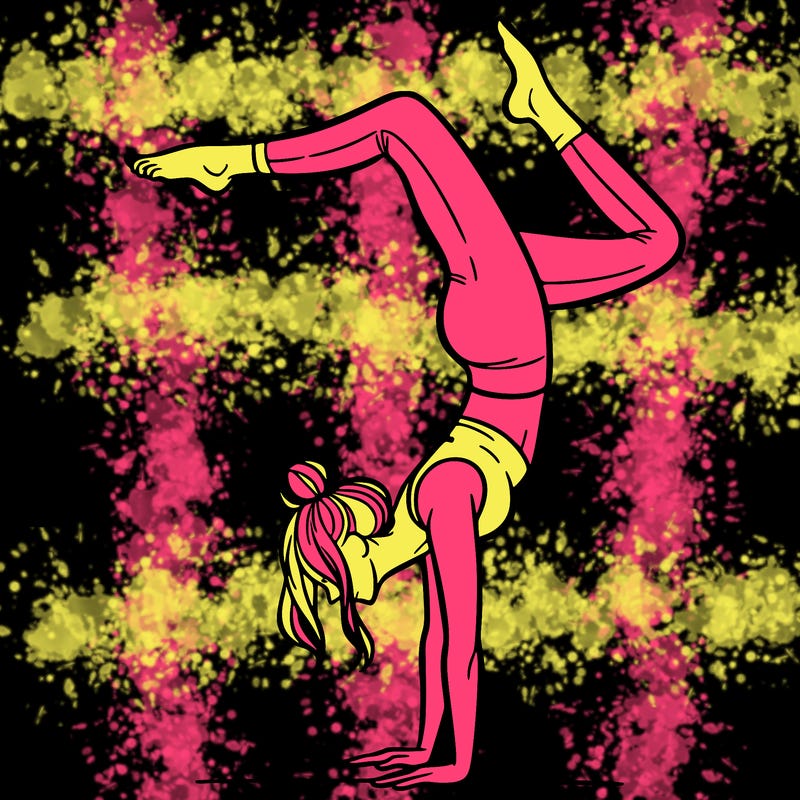 a woman doing a handstand