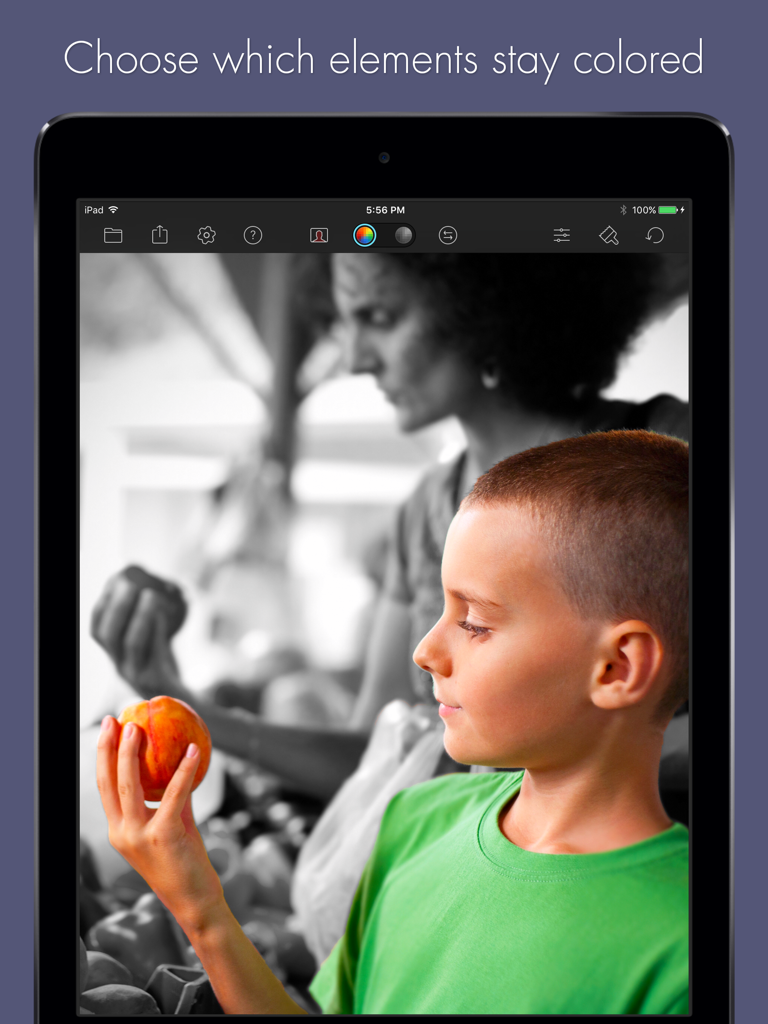 A screenshot of Color Splash for iPad showing selective color editing on a photo of a child while the background remains black and white