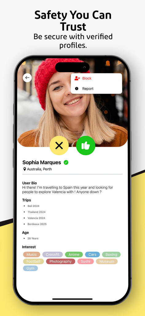 TRVL - Travel & Meet Friends - Mobile app screen for TRVL showing a verified traveler profile with safety reporting features