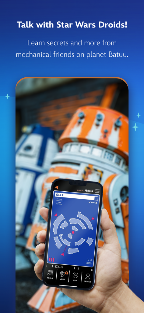 Play Disney Parks - Une personne utilisant l'application Play Disney Parks pour interagir avec des droïdes Star Wars dans le parc