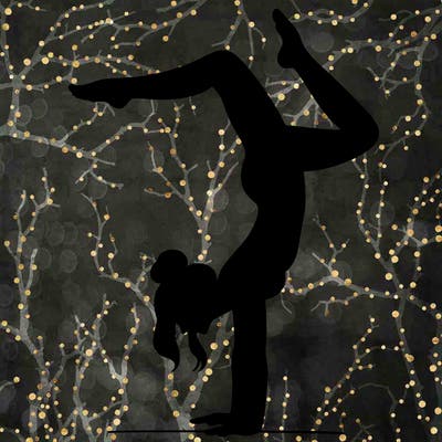 a woman doing a handstand