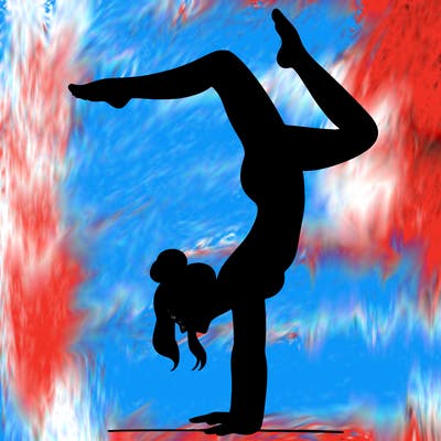 a woman doing a handstand