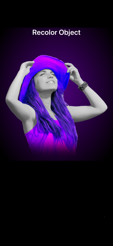 Beauty Photo-Filters & Effects - A woman with her hat and hair highlighted in bright purple using the Recolor Object feature