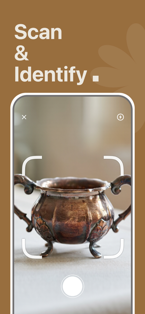 AntiqSnap: Antique ID & Value - A person using the AntiqSnap app to scan and identify an antique metal bowl.