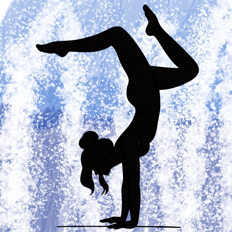 a woman doing a handstand