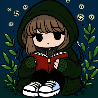 girl in oversized hoodie reading a book