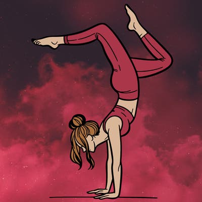 a woman doing a handstand