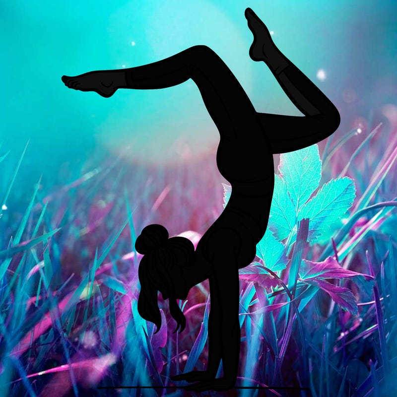 a woman doing a handstand