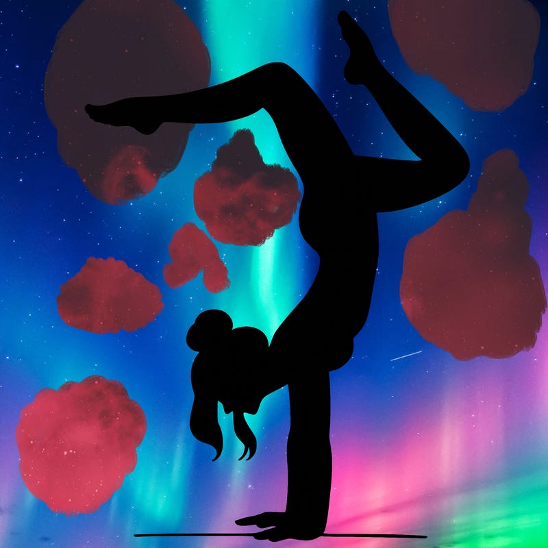 a woman doing a handstand