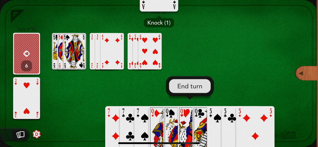 Gin Rummy - Classic Gin Rummy card game interface showing cards arranged on a green felt table with gameplay buttons