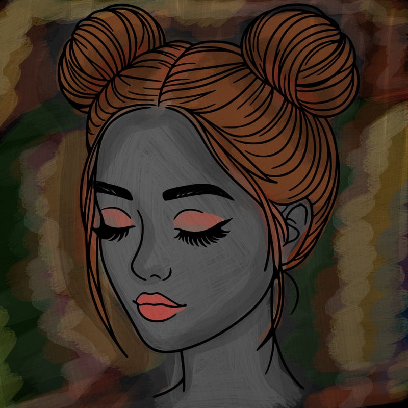 woman with hair buns