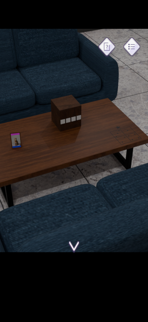 Escape Room President’s Office - A wooden puzzle box and a small cat photo on a coffee table in a modern office.