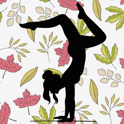 a woman doing a handstand