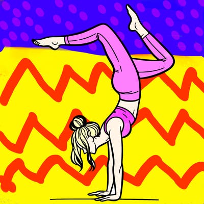 a woman doing a handstand