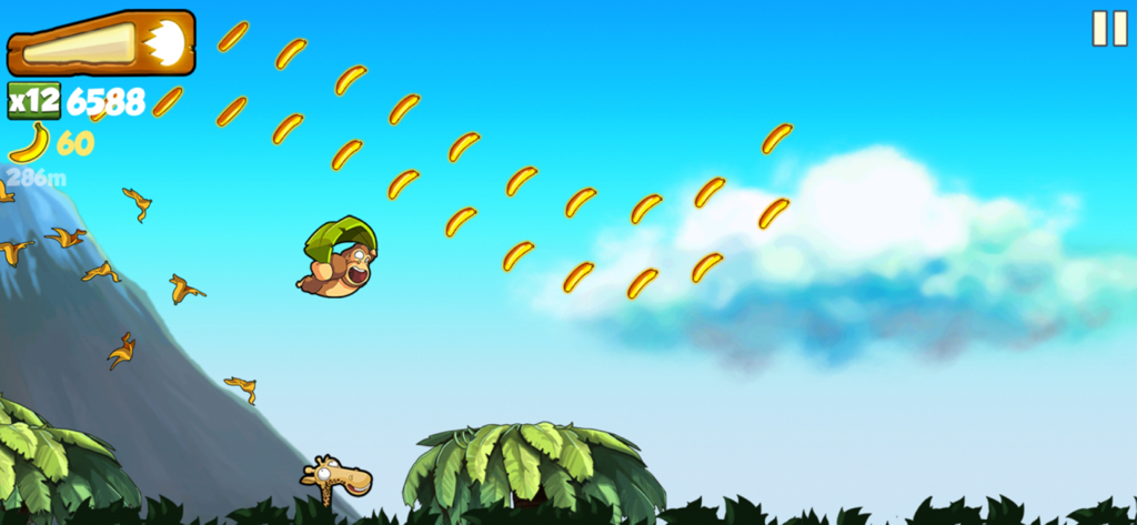Banana Kong - Banana Kong gorilla character gliding through the sky with a leaf while collecting bananas