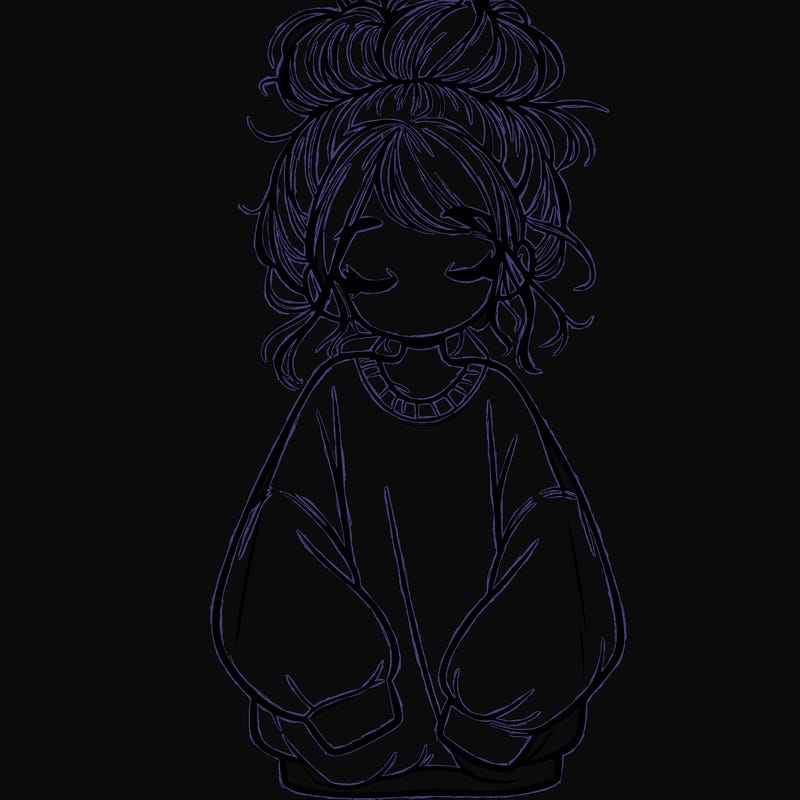 girl with baggy sweatshirt and messy bun