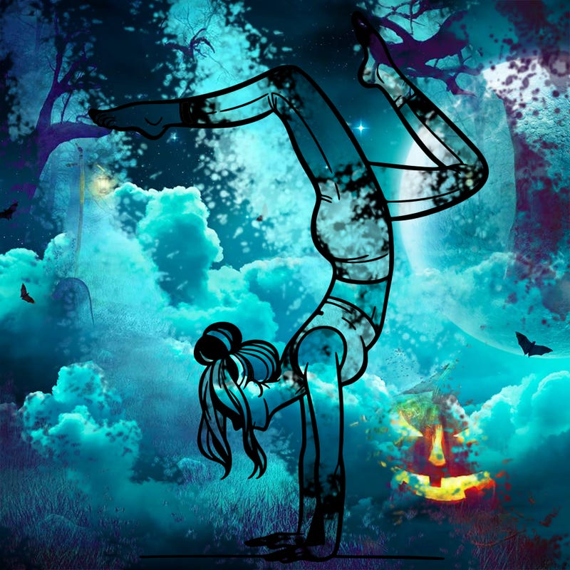 a woman doing a handstand