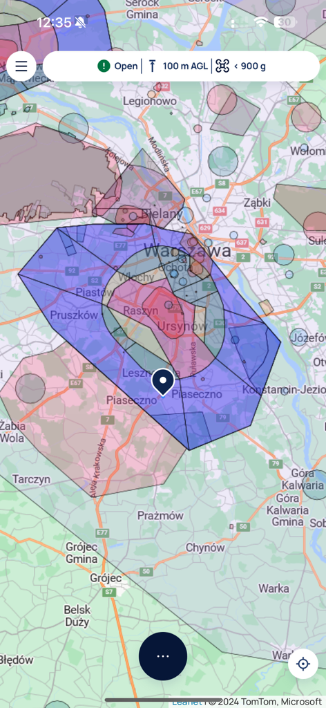 DroneTower app interface displaying a map with drone flight restriction zones in Poland