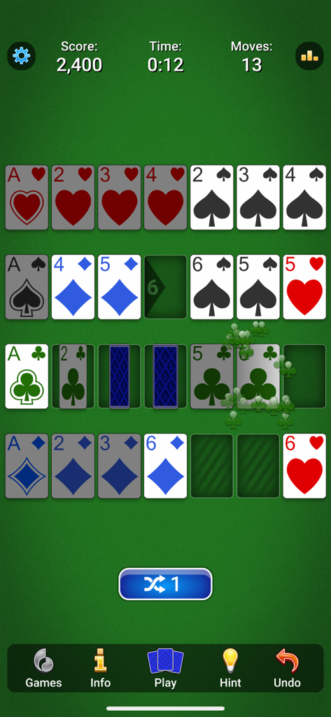 A gameplay screenshot of Addiction Solitaire showing cards being arranged in sequence on a classic green background.
