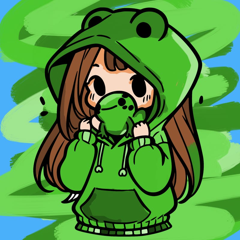 a girl holding a froggy hoodie