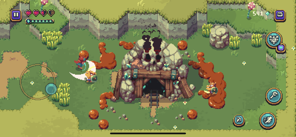 Sparklite - Top down pixel art gameplay of Sparklite showing a character attacking enemies near a skull shaped mine entrance