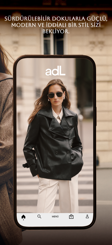 adL - Fashion - Una donna che indossa un moderno tailleur nero e pantaloni bianchi sullo schermo dell'app di moda adL.