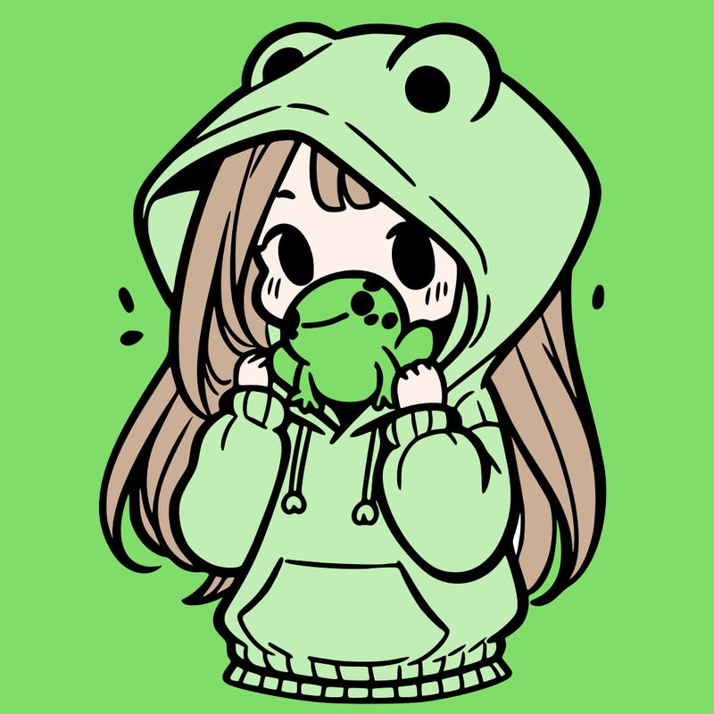 a girl holding a froggy hoodie
