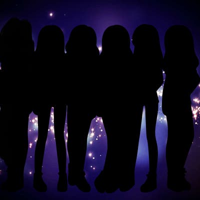 a group of girls wearing crop tops and shorts