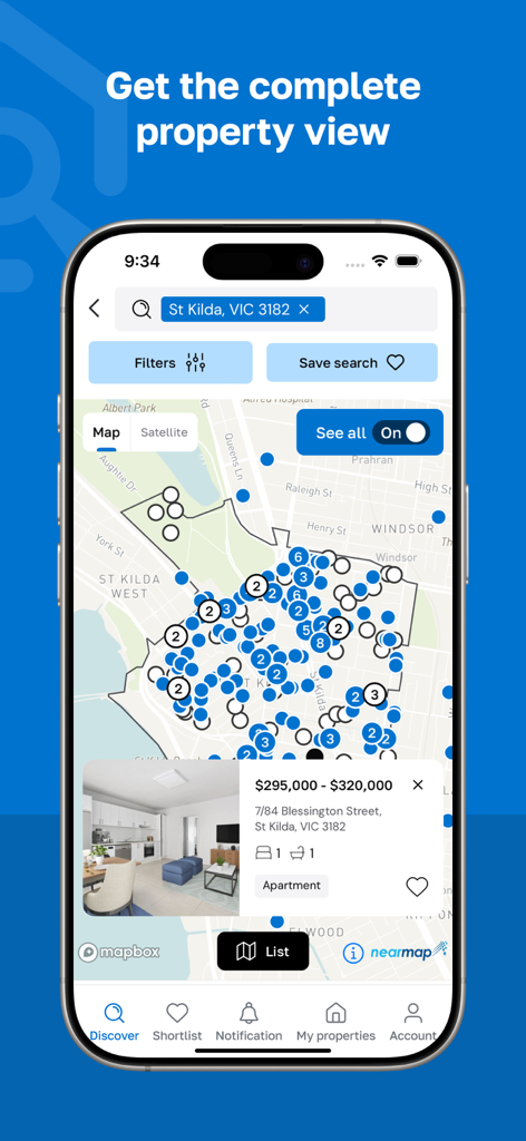 view.com.au - A smartphone displaying the view.com.au app with a map-based property search in St Kilda, showing numerous listings and a detailed apartment card.