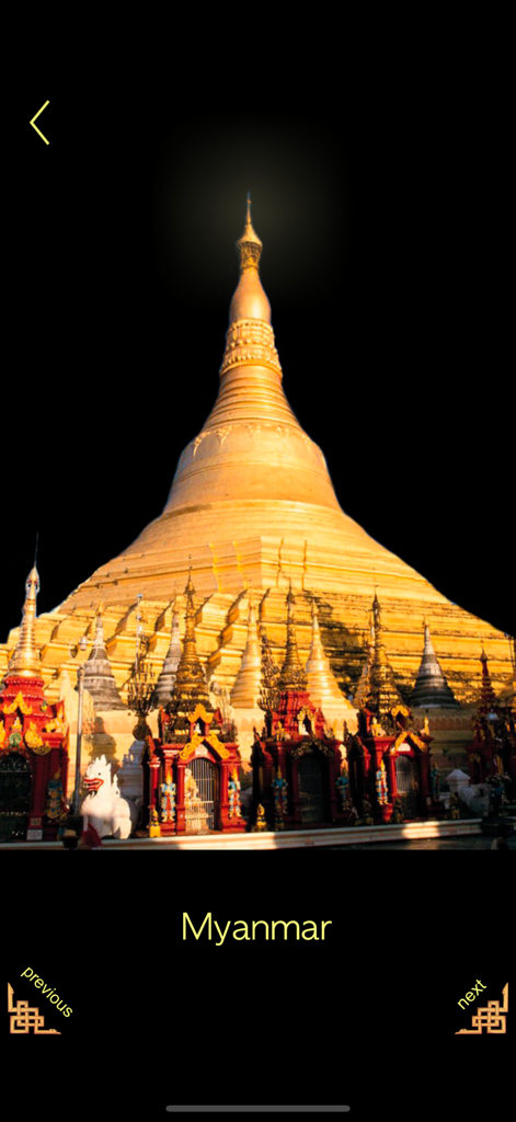 Buddha - Magic Prayer Wheel ! - A large golden Buddhist pagoda in Myanmar against a black background