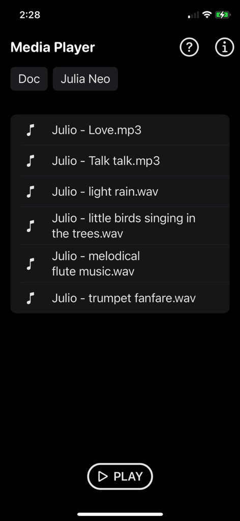 Media Player Plus - Media Player Plus user interface displaying a list of audio files and a play button.