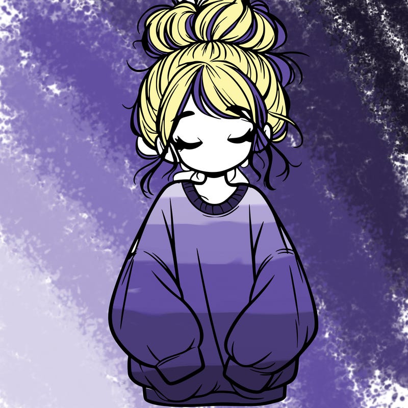 girl with baggy sweatshirt and messy bun