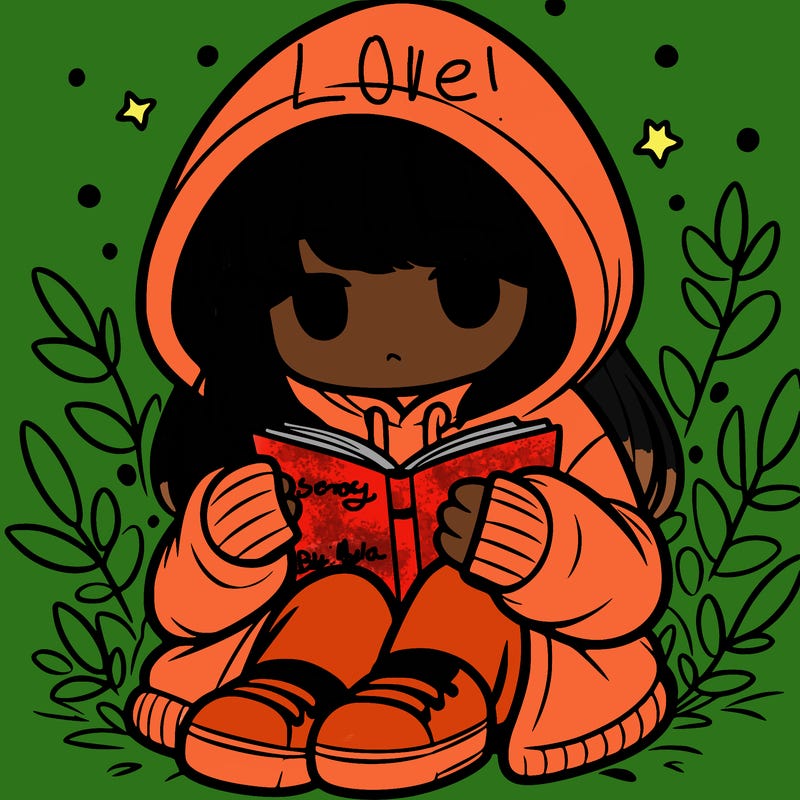 girl in oversized hoodie reading a book