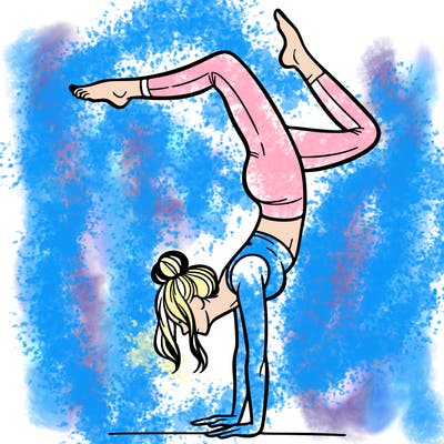 a woman doing a handstand
