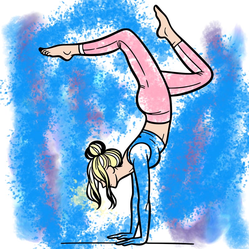 a woman doing a handstand