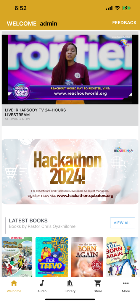 Pantalla de inicio de la aplicación Rhapsody of Realities con una transmisión de TV en vivo y los últimos libros devocionales.