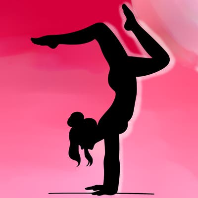 a woman doing a handstand