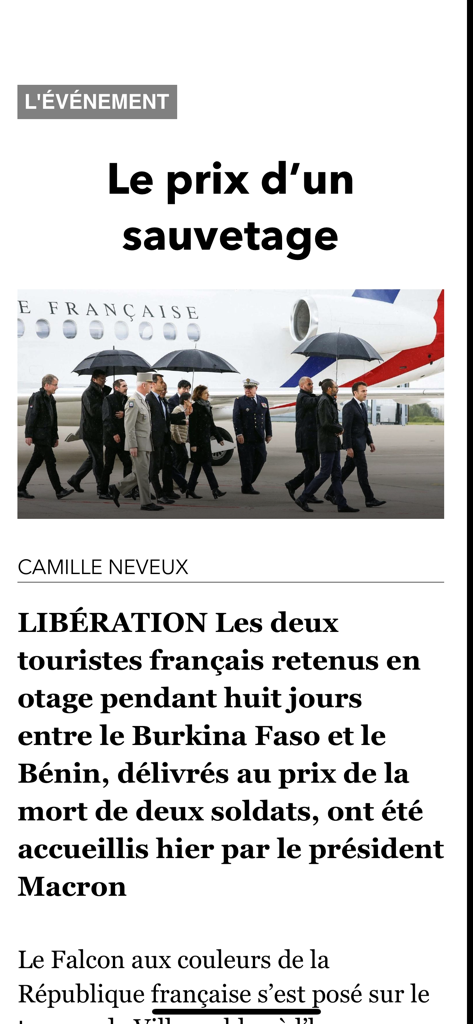 A news article in the JDD app regarding a hostage rescue featuring President Emmanuel Macron on an airport tarmac.