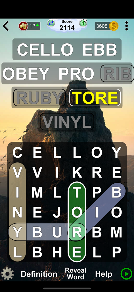 Arrow Crossword & Other Games - Word search puzzle grid with found words over a scenic mountain background