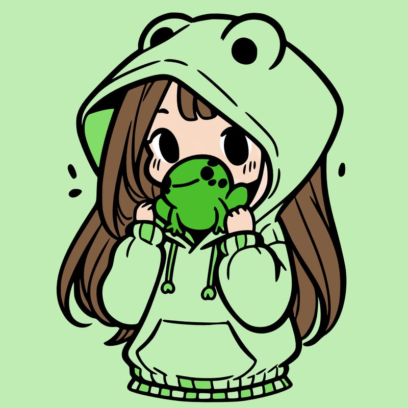 a girl holding a froggy hoodie