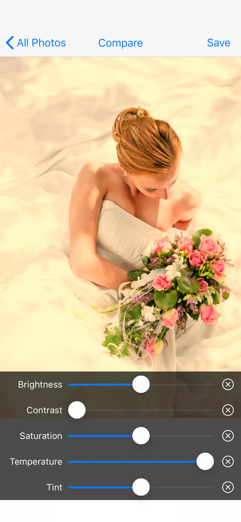 Interfaccia dell'app Color Control che mostra cursori per luminosità contrasto saturazione temperatura e tinta durante la modifica di una foto di una sposa