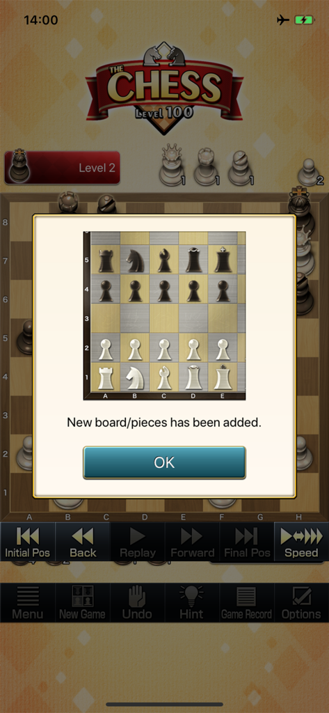 Une notification pop-up dans l'application The Chess Lv 100 confirmant l'ajout de nouveaux styles d'échiquier et de pièces