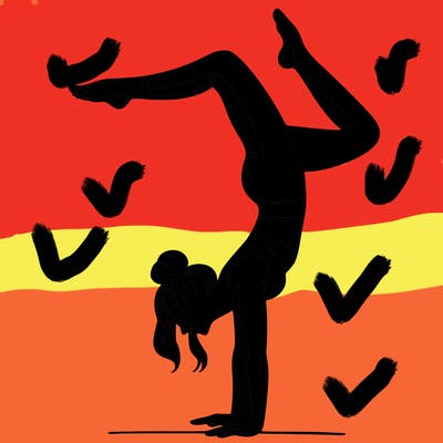 a woman doing a handstand