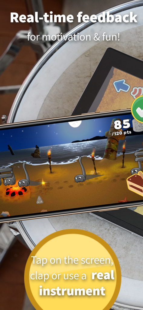 Learn music: Rhythmic Village - A smartphone displaying the Rhythmic Village game placed on a physical drum to show real-time feedback functionality.