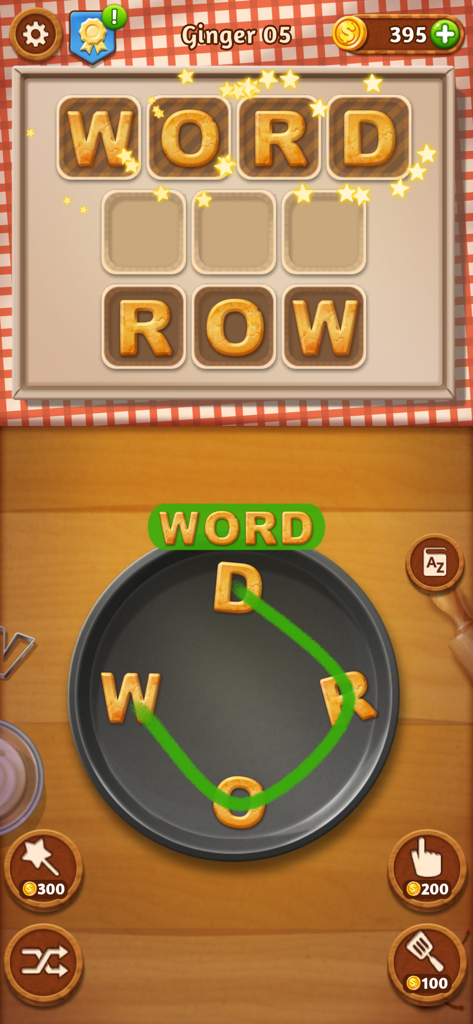 Gameplay of Word Cookies showing a baking-themed word puzzle where letters are swiped to form words on a baking sheet