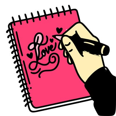 a hand writing “love” in calligraphy on a notebook