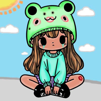 a girl wearing a frog hat and some frog socks