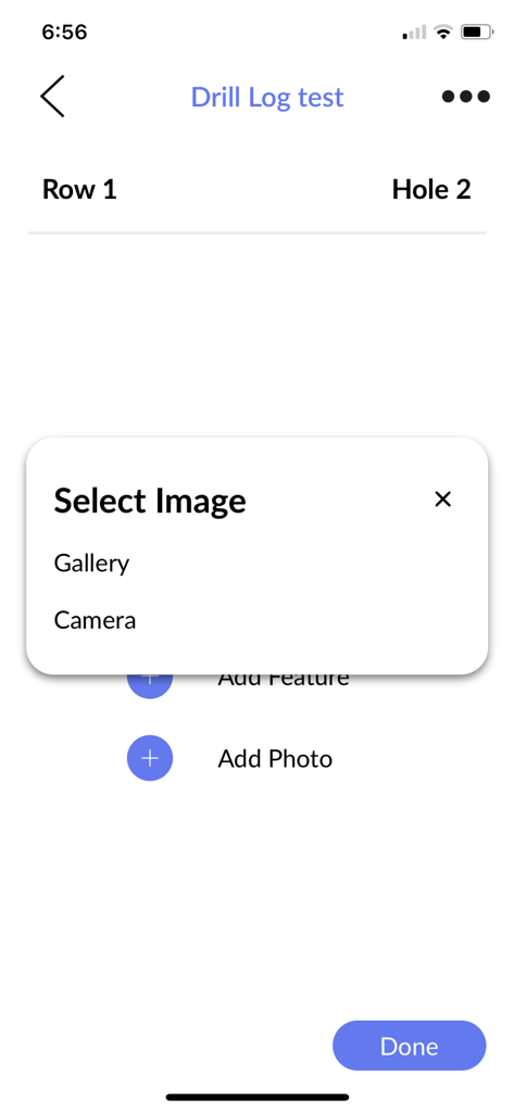 Strayos Fielder mobile app interface showing the select image popup with gallery and camera options for a drill log entry.