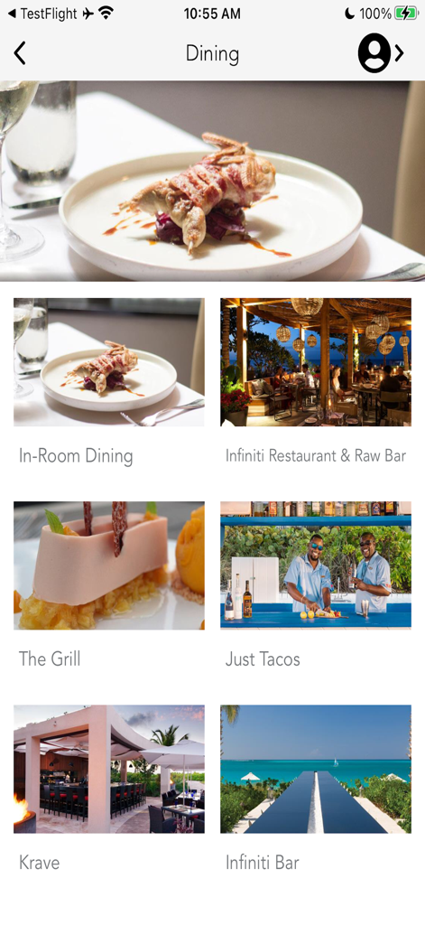 Interfaz de la aplicación móvil que muestra opciones de cenas de lujo y restaurantes en Grace Bay Resorts.