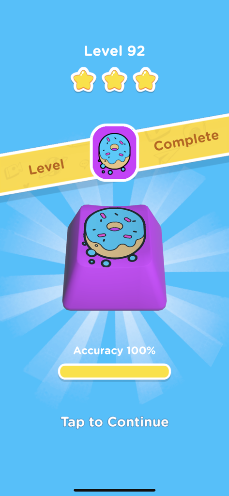 Keyboard Art level complete screen featuring a custom purple keycap with a blue donut design.